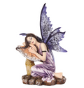Sleeping Fairy with Purple Wings Figurine in lavender gown on mossy stone base
