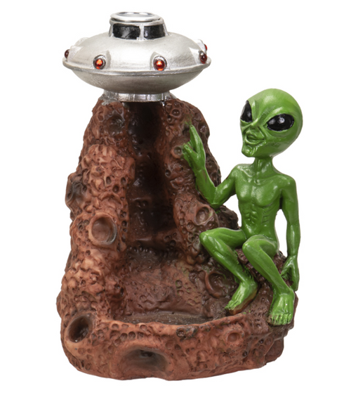 Alien backflow incense burner with green alien figure and UFO on rocky base
